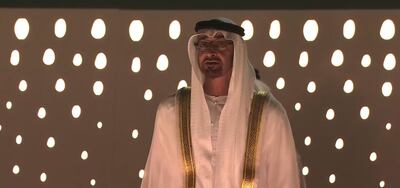 Sheikh Mohamed bin Zayed, Crown Prince of Abu Dhabi and Deputy Supreme Commander of the Armed Forces, stands for the national anthem and sings its verses. Courtesy: UAE National Day