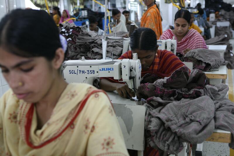 Dhaka, Bangladesh - June 14, 2008 - Workers sew H&M clothing at Sterling garment factory.  (Nicole Hill / The National) *** Local Caption ***  NH Bangladesh474.JPGFO13_BangledeshGarment5.JPG