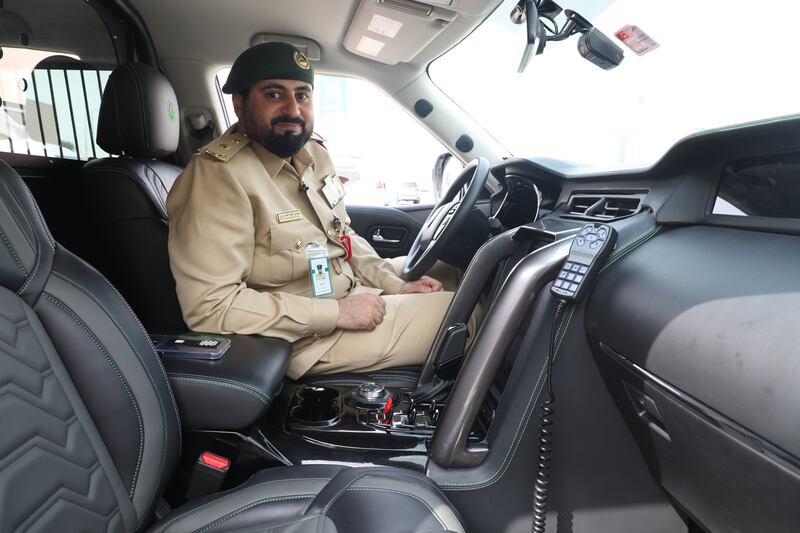 First Lt Engineer Mohamed Zainal behind the wheel of a Ghiath smart patrol car. All photos: Nilanjana Gupta/ The National 