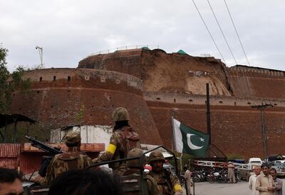 The earthquake damaged a wall of a fort used by Pakistan security forces in Peshawar. AFP 