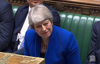 epa07737039 A grab from a handout video made available by the UK Parliamentary Recording Unit shows British Prime Minister Theresa May (R) smiles during her last Prime Minister's Questions (PMQs) at the House of Commons parliament in London, Britain, 24 July 2019. Theresa May is stepping down as British Prime Minister following her resignation as Conservative Party leader on 07 June. Former London mayor and foreign mnister Boris Johnson is taking over the post after he was elected party leader the previous day.  EPA/UK PARLIAMENTARY RECORDING UNIT / HANDOUT MANDATORY CREDIT: UK PARLIAMENTARY RECORDING UNIT HANDOUT EDITORIAL USE ONLY/NO SALES