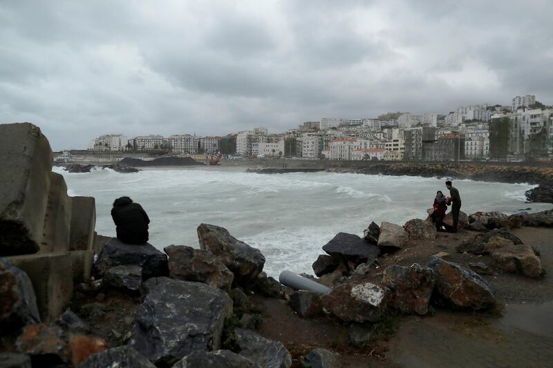 People are pictured on the edge of the Ketani beach at Bab El Oued in Algiers, Algeria. Reuters