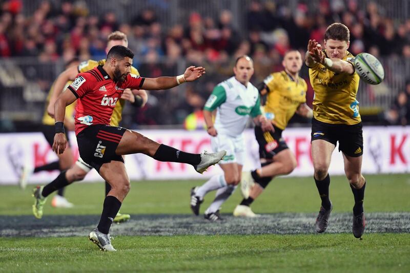 CHRISTCHURCH, NEW ZEALAND - JULY 28: Richie Mo'unga of the Crusaders kicks the ball during the Super Rugby Semi Final match between the Crusaders and the Hurricanes at AMI Stadium on July 28, 2018 in Christchurch, New Zealand.  (Photo by Kai Schwoerer/Getty Images)