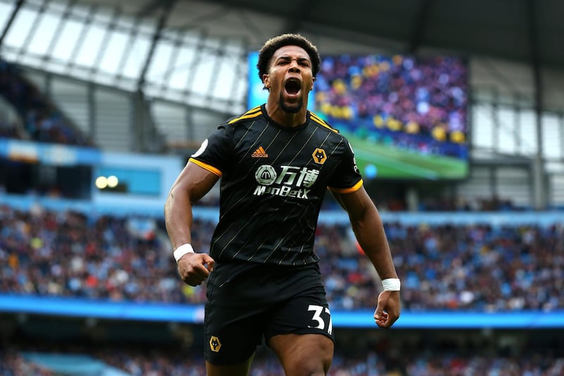 MANCHESTER, ENGLAND - OCTOBER 06: Adama Traore of Wolverhampton Wanderers celebrates after scoring his team's first goal during the Premier League match between Manchester City and Wolverhampton Wanderers at Etihad Stadium on October 06, 2019 in Manchester, United Kingdom. (Photo by Alex Livesey/Getty Images)