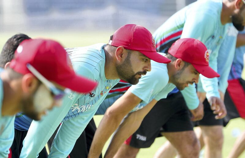 ABU DHABI ,  UNITED ARAB EMIRATES , AUGUST 22 – 2019 :- Rashid Khan, captain ( center ) with the members of the Afghanistan cricket team during the training ahead of their tour to Bangladesh at the Zayed Cricket Stadium in Abu Dhabi. ( Pawan Singh / The National ) For Sports. Interview Story by Amith
