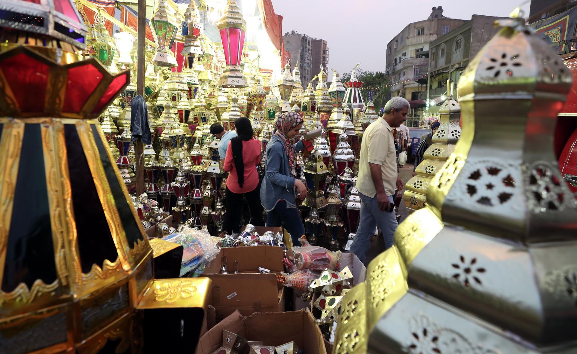 Egyptians buy Ramadan decorations such as the fanous, or lantern, at a market in Cairo. EPA