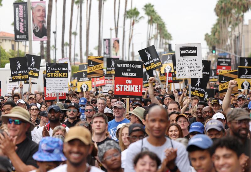 Sag-Aftra and Writers Guild of America members rally during the strike in Los Angeles, California. Reuters