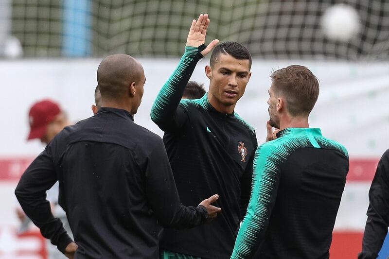 Cristiano Ronaldo, Joao Mario and Adrien Silva take part in a training session for Portugal. Paulo Novais / EPA