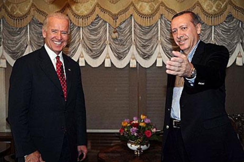 The US vice president Joe Biden, left, meets Mr Erdogan in Istanbul on Saturday. Mr Biden has been one of the Turkish leader’s few visitors since his operation.