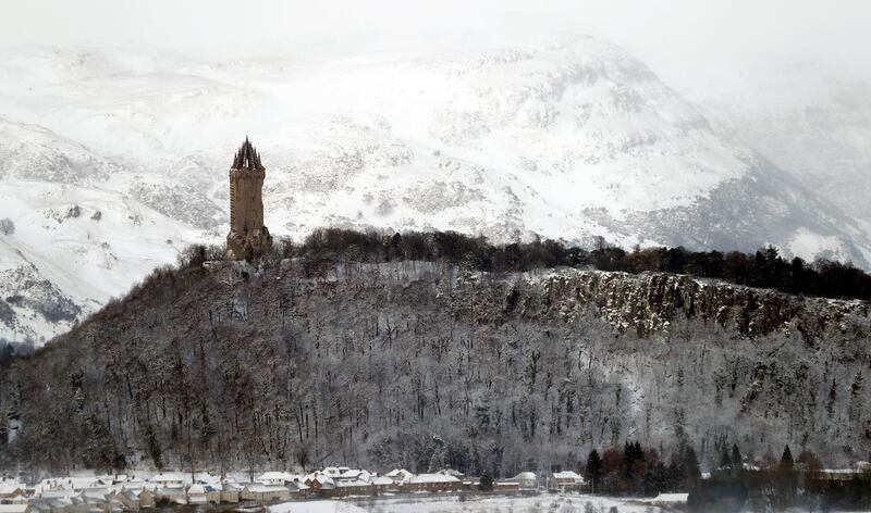 The Wallace Monument can be seen in the snow near Sterling, Scotland. Russell Cheyne / Reuters