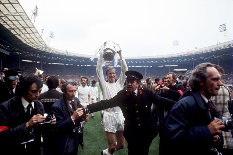 Leeds United's Jack Charlton celebrates with the FA Cup after his team's 1-0 win against Arsenal in 1972. PA