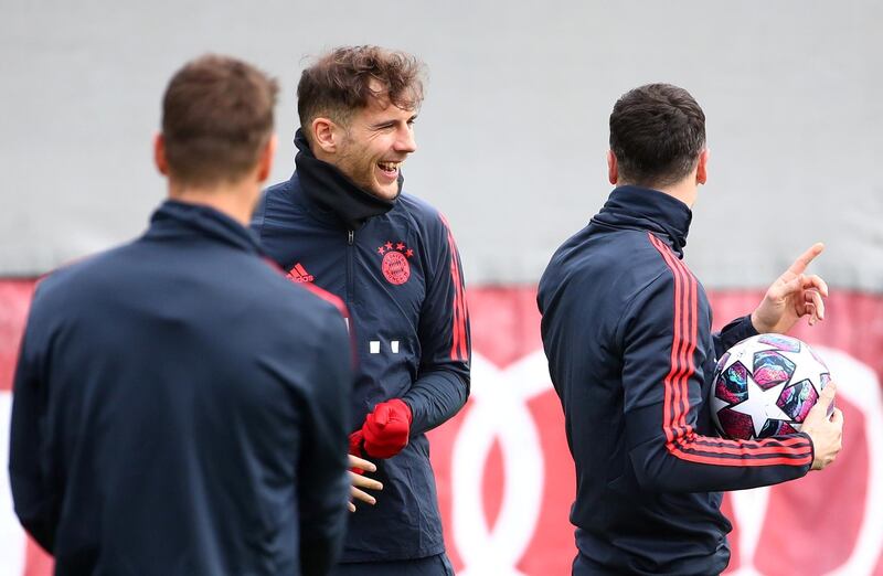 Bayern Munich's Leon Goretzka shares a joke during training. Reuters