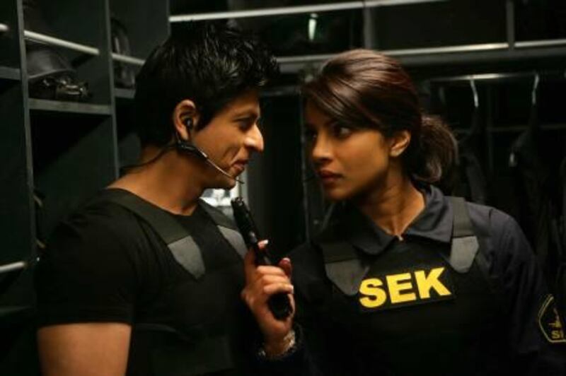  Priyanka Chopra with Shah Rukh Khan  in a scene from Don 2  Courtesy Excel Entertainment