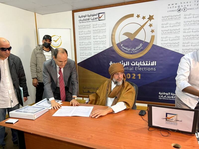 Saif Al Islam Qaddafi, son of Libya's former leader Muammar Qaddafi, registers as a presidential candidate for the December 24 election at the registration centre in the southern town of Sebha, Libya, on November 14. Reuters