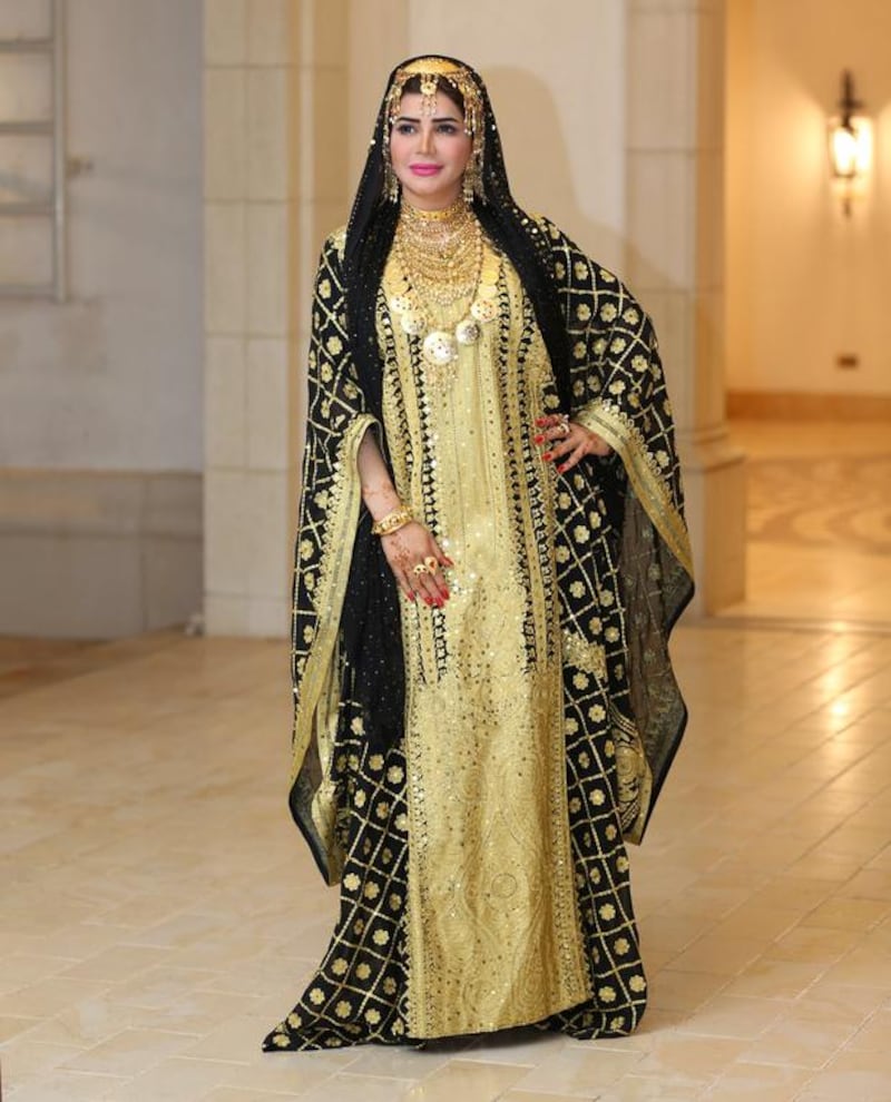 Manal Ahmed, the first Emirati woman to be named Fashion Arabia ambassador, wears traditional Emirati dress and jewellery. She wants to take the UAE’s cultural fashion to the world. Courtesy Manal Ahmed