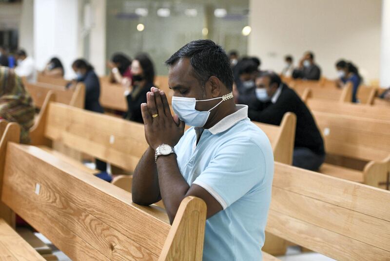 Abu Dhabi, United Arab Emirates - Worshippers must follow safety guidelines at St. PaulÕs Catholic Church in Mussafah. Khushnum Bhandari for The National