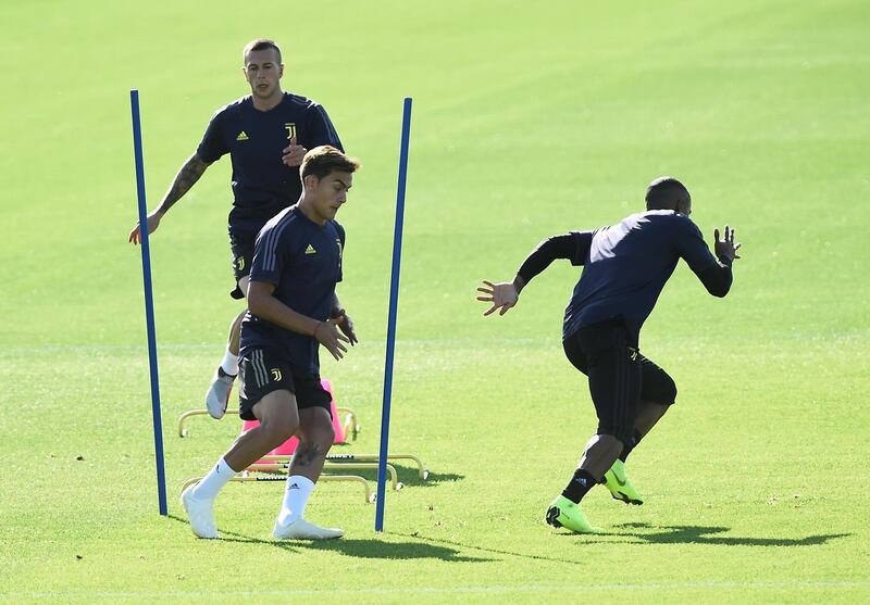 Federico Bernardeschi and Paulo Dybala during training. Reuters