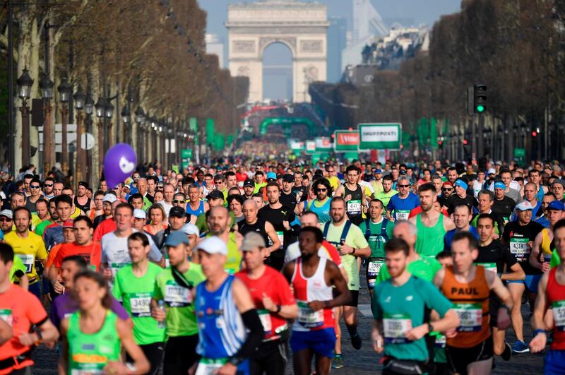 Runners compete during the 42nd edition of the Paris Marathon. Eric Feferberg / AFP
