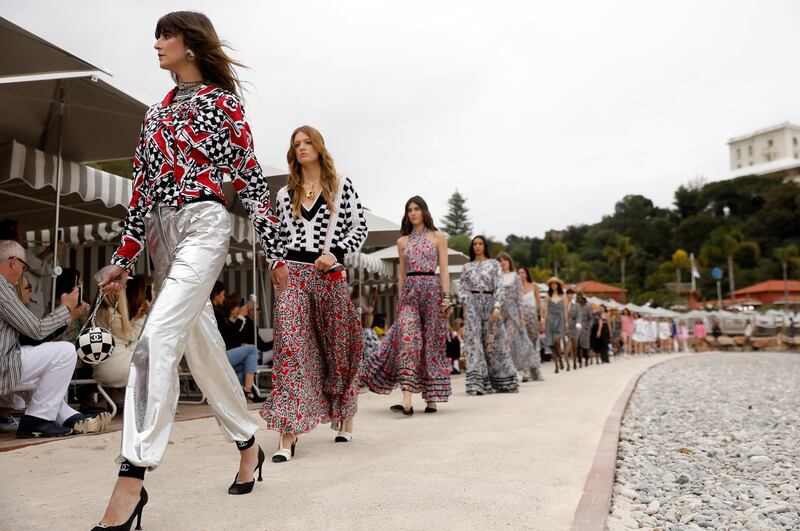 The Chanel cruise 2022/23 collection is jaunty and upbeat, with plenty of clashing patterns and relaxed silhouettes. Photo: EPA