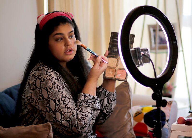 A Bahrain make-up artist, Eman Javeed, gives online make-up classes from her home in Isa, Bahrain. Reuters