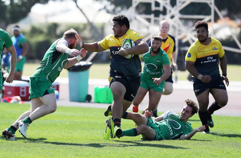 DUBAI , UNITED ARAB EMIRATES , FEB 02 – 2018 :-  Gerard Faitotoa ( no 1 yellow with ball ) of Dubai Hurricane in action during the rugby match between Dubai Sports City Eagles vs Dubai Hurricane held at Dubai Sports City in Dubai. (Pawan Singh / The National) For Sports. Story by Paul Radley