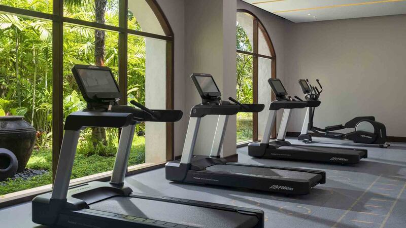 The fitness centre overlooks the resort's tropical gardens.