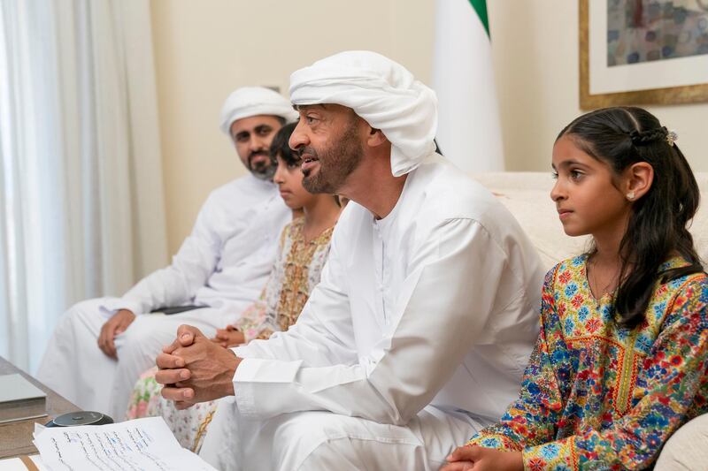 ABU DHABI, UNITED ARAB EMIRATES - May 19, 2020: HH Sheikh Mohamed bin Zayed Al Nahyan, Crown Prince of Abu Dhabi and Deputy Supreme Commander of the UAE Armed Forces (2nd R), participates in an online lecture by HE Obaid Rashid Al Shamsi, Director-General of the National Emergency Crisis and Disaster Management Authority, titled “Honoring Our Traditions, Valuing Our Safety”. The lecture was broadcast on Al Emarat Channel as part of the Ramadan lecture series of Majlis Mohamed bin Zayed. Seen with HH Sheikha Shamma bint Khaled bin Mohamed bin Zayed Al Nahyan (R), HH Sheikha Fatima bint Mohamed bin Hamad bin Tahnoon Al Nahyan (3rd R) and HH Sheikh Theyab bin Mohamed bin Zayed Al Nahyan, Abu Dhabi Executive Council member and Chairman of the abu Dhabi Crown Prince Court (CPC) (L).

( Hamad Al Kaabi / Ministry of Presidential Affairs )​
---