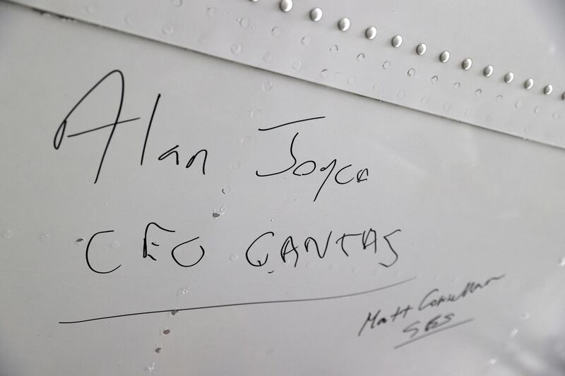 The signature of Alan Joyce is seen at the bottom of a Qantas 747 jumbo jet. Reuters