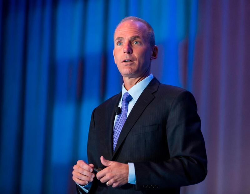 (FILES) In this file photo taken on September 22, 2015, Boeing CEO Dennis Muilenburg gives a keynote speech during the SAE Aerotech Congress in Seattle, Washington.  Boeing's 737 MAX could be brought back into service gradually by government regulators but is still on track to be cleared to fly again in 2019, Muilenburg said on September 11, 2019. / AFP / GETTY IMAGES NORTH AMERICA / STEPHEN BRASHEAR
