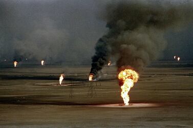 This file photo taken on March 14, 1991 shows an aerial view of burning oil wells in Al Ahmadi oil field in Kuwait, set ablaze by retreating Iraqi troops. AFP