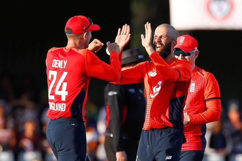 Cricket - South Africa v England - First T20 - Buffalo Park, East London, South Africa - February 12, 2020  England's Moeen Ali celebrates the wicket of South Africa's Quinton de Kock with teammates    Action Images via Reuters/Rogan Ward