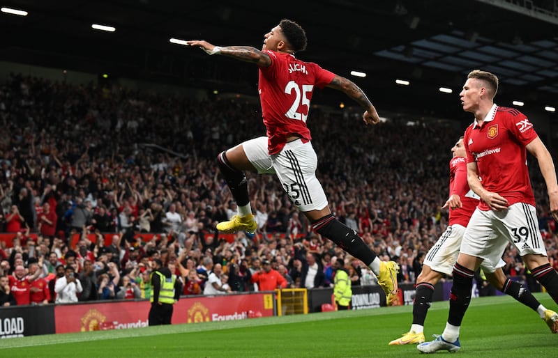 Jadon Sancho celebrates after putting Manchester United ahead in the 2-1 win against Liverpool at Old Trafford on August 22, 2022. AFP