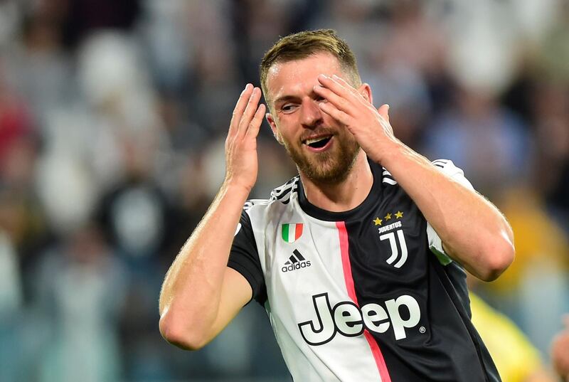Juventus' Aaron Ramsey reacts to a missed chance. AFP