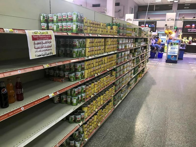 French products are taken off shelves after Kuwaiti supermarkets boycotted the country's goods, in Kuwait City. Reuters