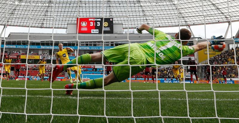 Erling Braut Haaland scores for Borussia Dortmund from the penalty spot to earn his team a 4-3 Bundesliga win over Bayer Leverkusen at the BayArena on Saturday, September 11. AP