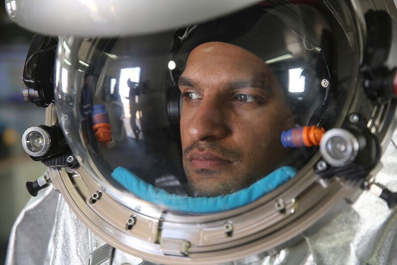 Analog astronaut Kartik Kumar wearing an experimental space suit. Sam McNeil / AP Photo