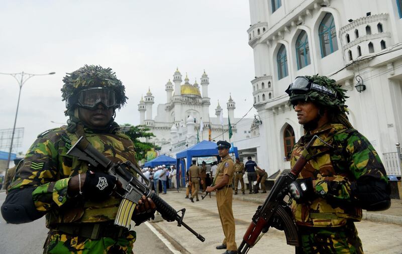 Security personnel stand guard outside a mosque in Colombo, Sri Lanka. AFP