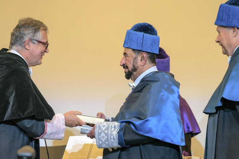 Sheikh Dr Sultan bin Muhammad Al Qasimi receives his honorary doctorate from Rafael Garesse, the dean of Universidad Autónoma de Madrid (Autonomous University of Madrid). Courtesy Sharjah Media Office