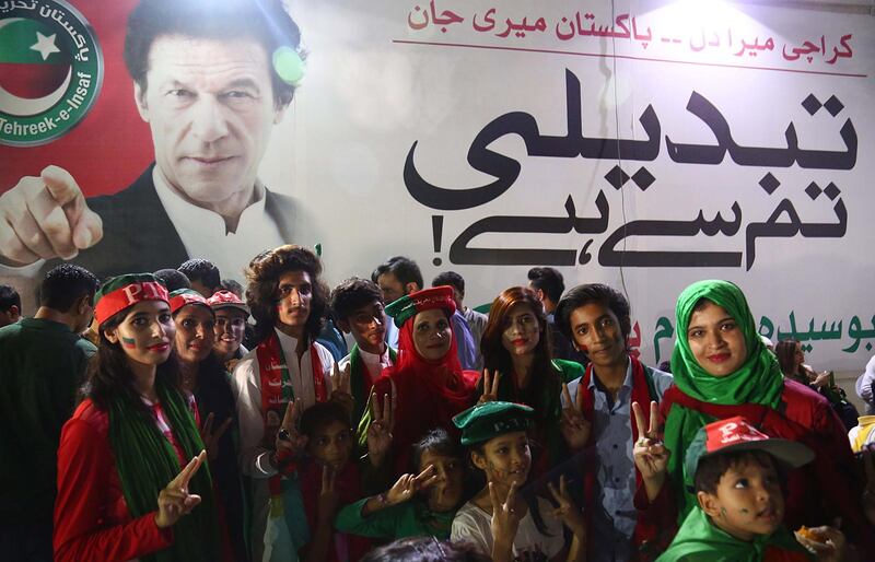 epa06912234 Supporters of Imran Khan, head of Pakistan Tehreek-e-Insaf (PTI) party celebrate in Karachi, Pakistan, 26 July 2018. Pakistan's Tehreek-e-Insaf party of former international cricketer Imran Khan is leading unofficial and partial vote counts in Pakistan's general election, while the release of official figures has been delayed due to technical failures. Elections in Pakistan were held a day earlier after tense campaigning plagued by allegations of rigging in favor of the PTI by the establishment, a term used to refer to the Pakistani army which has denied interference.  EPA/SHAHZAIB AKBER