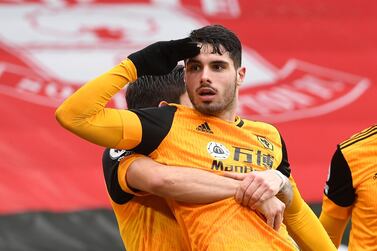 Wolverhampton Wanderers' Pedro Neto celebrates scoring their second goal during the English Premier League soccer match between Wolverhampton Wanderers and Southampton at St. Mary's Stadium in Southampton, England, Sunday, Feb.14, 2021.( (Andy Rain/Pool via AP)