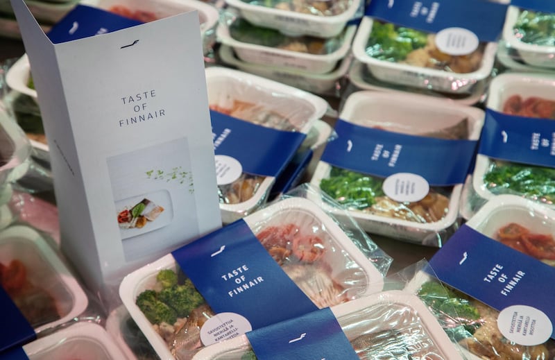 epa08769972 Flight meals of Finnish carrier Finnair are sold in the K-Citymarket Tammisto supermarket in Vantaa, Finland, 24 October 2020. In a time when the travel industry is hit hard by the pandemic coronavirus, Finnair sees selling its onboard inflight meals as a new business opening and an opportunity to keep the chefs employed. Finnair has its own kitchen near K-Citymarket Tammisto.  EPA/MAURI RATILAINEN