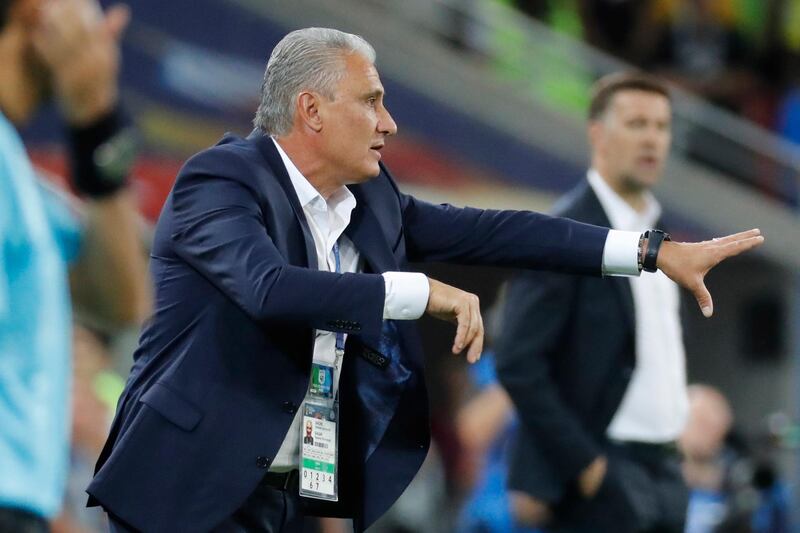 epa06845514 Brazil's coach Tite reacts during the FIFA World Cup 2018 group E preliminary round soccer match between Serbia and Brazil in Moscow, Russia, 27 June 2018.

(RESTRICTIONS APPLY: Editorial Use Only, not used in association with any commercial entity - Images must not be used in any form of alert service or push service of any kind including via mobile alert services, downloads to mobile devices or MMS messaging - Images must appear as still images and must not emulate match action video footage - No alteration is made to, and no text or image is superimposed over, any published image which: (a) intentionally obscures or removes a sponsor identification image; or (b) adds or overlays the commercial identification of any third party which is not officially associated with the FIFA World Cup)  EPA/FELIPE TRUEBA   EDITORIAL USE ONLY