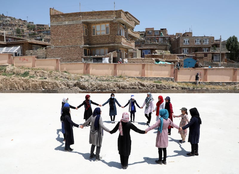 Fatima Noori, 15, and other schoolgirls attend a counselling session after a massive bomb exploded outside their school, killing at least 80 students in Kabul, Afghanistan. Reuters