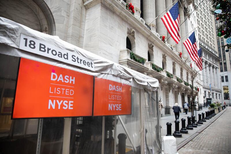 DoorDash Inc. signage outside the New York Stock Exchange (NYSE) during the company's initial public offering (IPO) in New York, U.S., on Wednesday, Dec. 9, 2020. DoorDash opened 84% above its IPO price. That's the third-best opening pop of 2020, excluding deals that raised less than $1 billion. Photographer: Michael Nagle/Bloomberg