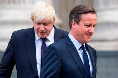 (FILES) In this file photo taken on July 07, 2015 British Prime Minister David Cameron (R) and London Mayor Boris Johnson leave St Paul's Cathedral in central London after attending a memorial service in memory of the 52 victims of the 7/7 London attacks. Former British prime minister David Cameron said Friday he had no regrets about launching the Brexit referendum but accused current PM Boris Johnson of behaving "appallingly" during the pre-vote campaigning. / AFP / JACK TAYLOR
