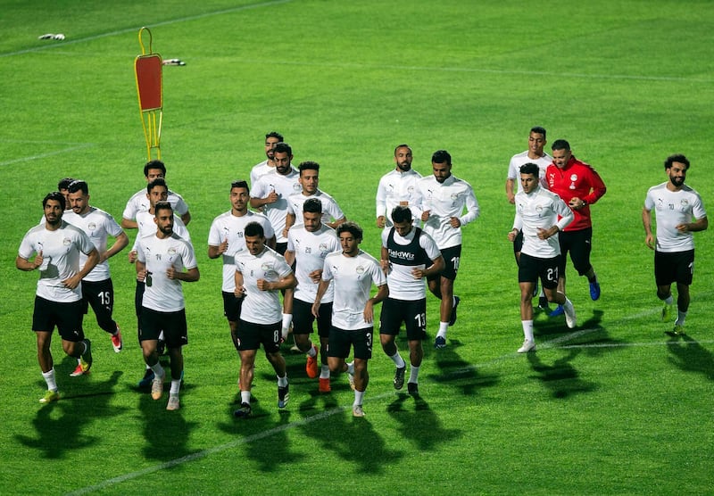 Egypt players jog during a training session for the Egypt national team in Cairo ahead of the Africa Cup of Nations qualification match against Kenya.