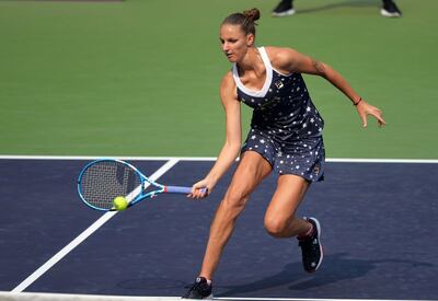 Karolina Pliskova of Czech Republic hits a return against Timea Bacsinszky of Switzerland in their women's singles semi-final match of the Tianjin Open tennis tournament in north China's Tianjin on October 13, 2018. China OUT
 / AFP / STR
