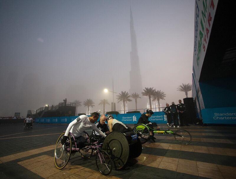 Dubai, United Arab Emirates, Jan 25 2013, 2013 Standard Chartered Dubai Marathon, - Elite wheelchair competitors get ready for the start at the Standard Chartered Dubai Marathon, Jan 25, 2013.  Mike Young / The National
