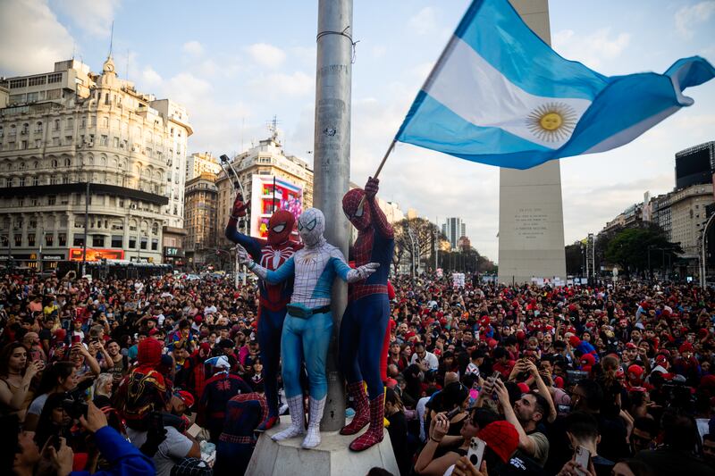 A crowd celebrates beating the world record for most people dressed as Spider-Man in one place, in Buenos Aires. Getty Images