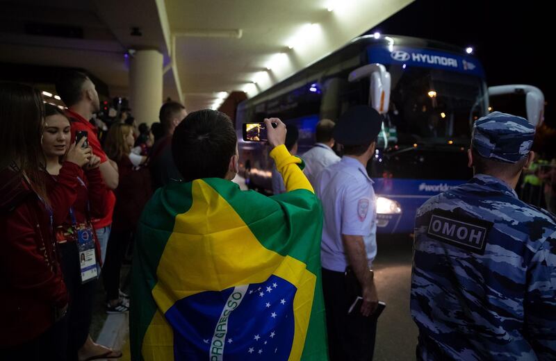 Team Brazilian team are greeted by fans as they arrive in Sochi. Their opening match is against Switzerland on June 17. Buda Mendes / Getty Images